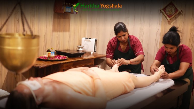 Ayurveda students practicing Snehana and Swedana in Panchakarma training
