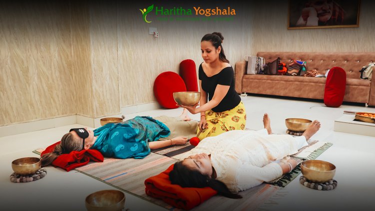 Person meditating with sound healing bowls to restore inner peace